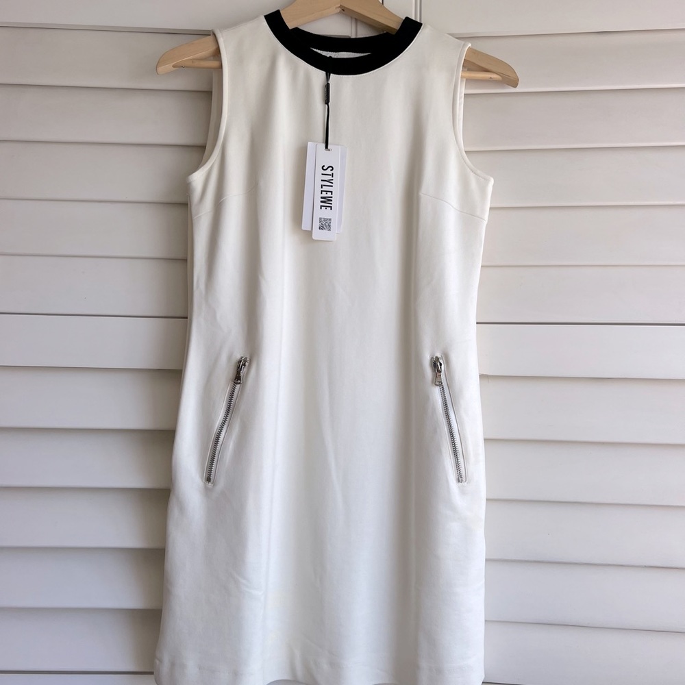 Black/white sleeveless mini dress. New with tags.